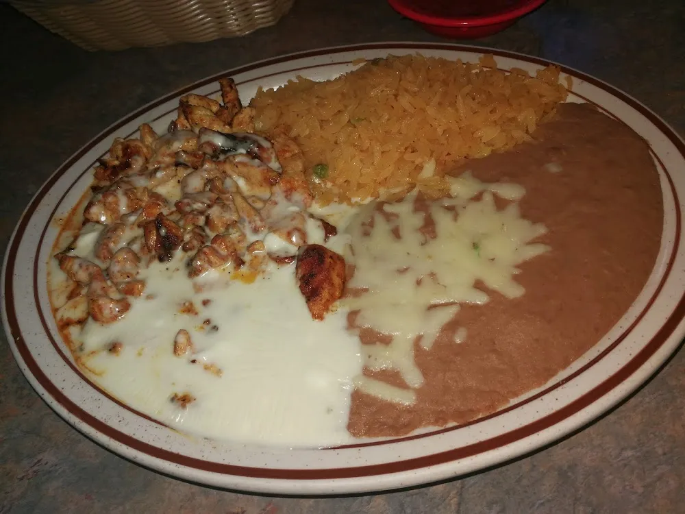 Pollo Con Crema with Rice and Beans